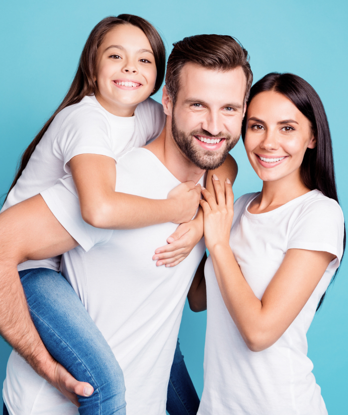 Image showing a smiling family a man , woman and a girl