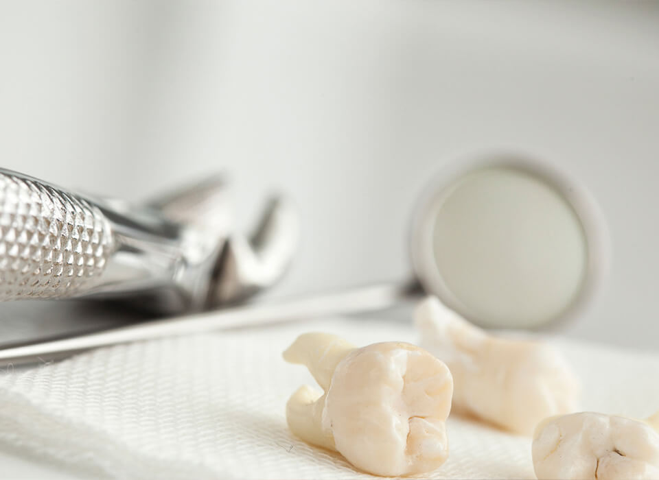 Banner image showing dental equipment and procelain teeth